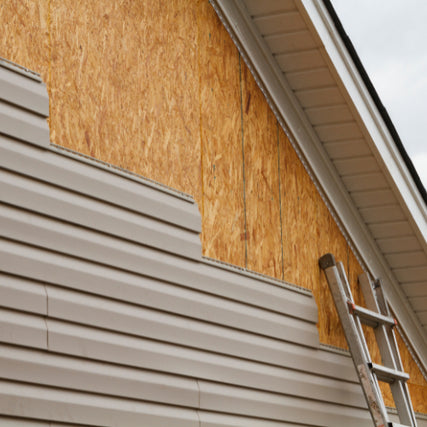 SidingVinyl siding being installed