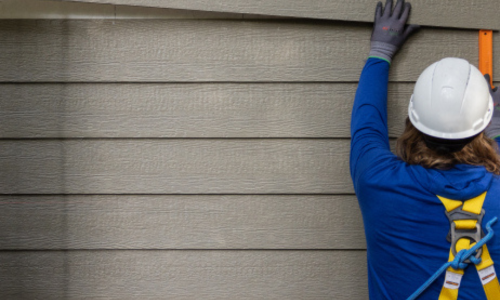 Exterior siding being installed.